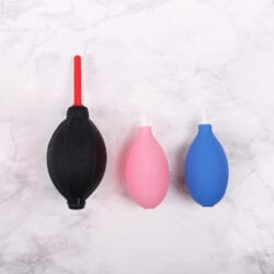 Professional eyelash extension air blowers in black, pink and blue, designed for gentle drying during lash treatments.
