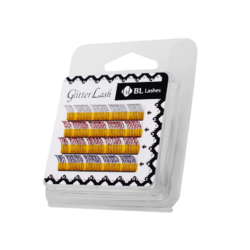BL Lashes Glitter Lash eyelash extensions in four sparkling colours, arranged in rows inside clear retail packaging.