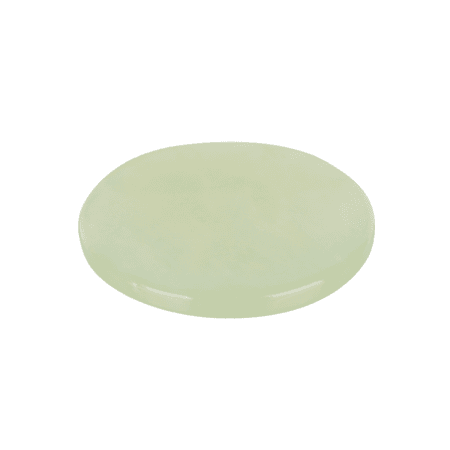 Pale green round jade stone palette for holding eyelash extension adhesive during professional lash treatments.