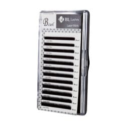 Laser Mink_under BL Lashes Laser Mink eyelash extensions in B curl, arranged in multiple rows inside a clear lash case.