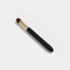 Professional lash pore cleansing brush with soft brown bristles, gold ferrule and black handle for cleaning eyelashes before treatments.