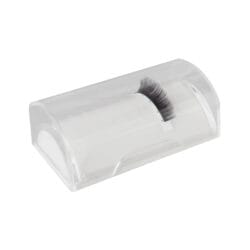 half-moon-2 Transparent half-moon lash holder with a curved surface and protective cover, displaying a strip of eyelash extensions.