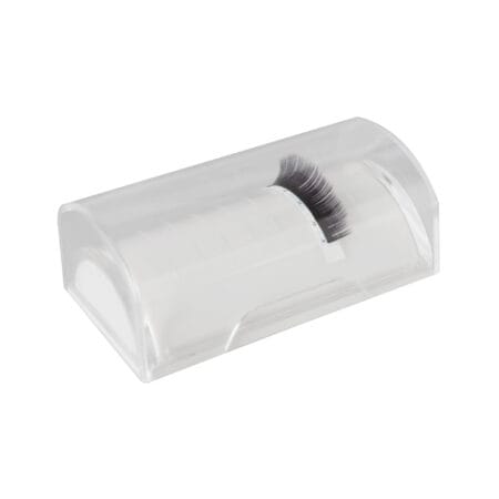 half-moon-2 Transparent half-moon lash holder with a curved surface and protective cover, displaying a strip of eyelash extensions.