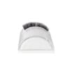 half-moon-4 Transparent half-moon lash holder with a curved surface displaying a strip of black eyelash extensions.