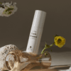 lash-primer-floral-lifestyle-4x5 BL Lashes Lash primer_NEW 50ml – product photo on grey background